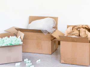 shipping boxes with internal protection materials, bubble wrap, paper