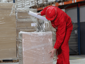 pallet being wrapped in shrink material