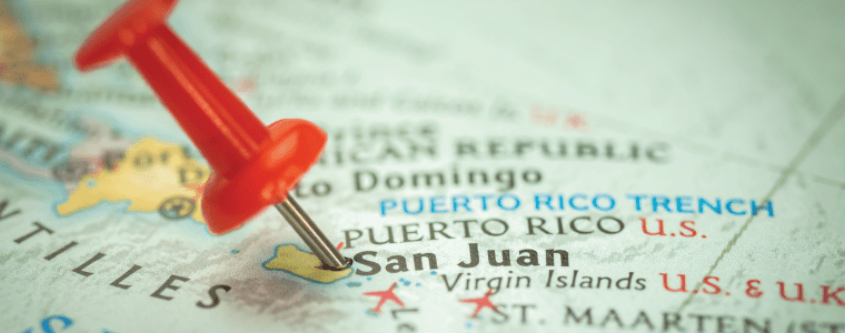 Location Puerto Rico and San Juan city, red push pin on the travel map, marker and point closeup, tourism and trip concept, North America