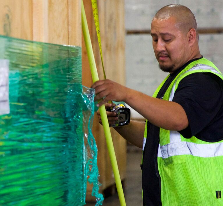 warehouse-worker-measuring-is-right warehouse workers