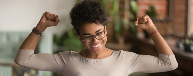 woman business owner celebrating